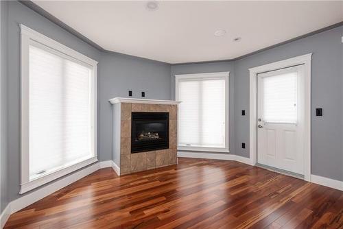 105 Cormorant Place, Fort Mcmurray, AB - Indoor Photo Showing Living Room With Fireplace