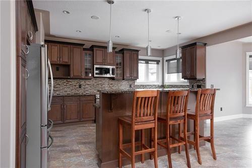 105 Cormorant Place, Fort Mcmurray, AB - Indoor Photo Showing Kitchen With Upgraded Kitchen