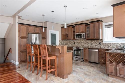 105 Cormorant Place, Fort Mcmurray, AB - Indoor Photo Showing Kitchen With Upgraded Kitchen