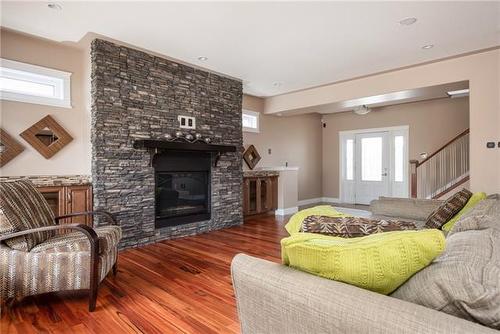 105 Cormorant Place, Fort Mcmurray, AB - Indoor Photo Showing Living Room With Fireplace