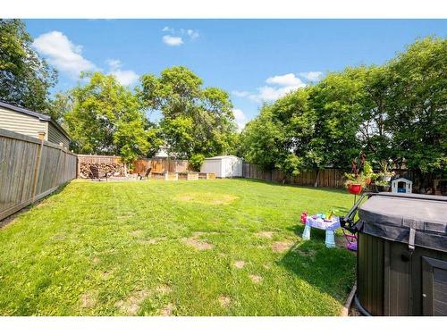 149 Ermine Crescent, Fort Mcmurray, AB - Outdoor With Backyard