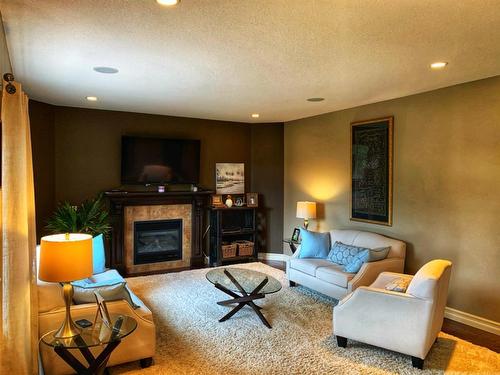 121 13348 Twp Rd 672A Subdivision, Lac La Biche, AB - Indoor Photo Showing Living Room With Fireplace