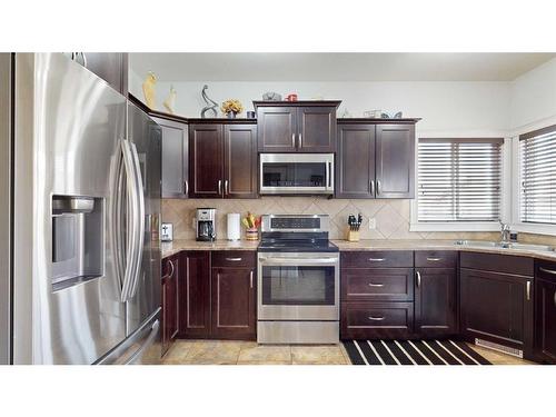 152 Fireweed Crescent, Fort Mcmurray, AB - Indoor Photo Showing Kitchen With Double Sink