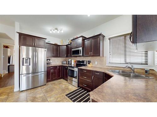 152 Fireweed Crescent, Fort Mcmurray, AB - Indoor Photo Showing Kitchen With Double Sink