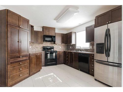 307-104 Loutit Road, Fort Mcmurray, AB - Indoor Photo Showing Kitchen With Stainless Steel Kitchen With Double Sink