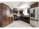 307-104 Loutit Road, Fort Mcmurray, AB  - Indoor Photo Showing Kitchen With Stainless Steel Kitchen With Double Sink 