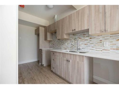 209 Siltstone Place, Fort Mcmurray, AB - Indoor Photo Showing Kitchen With Double Sink