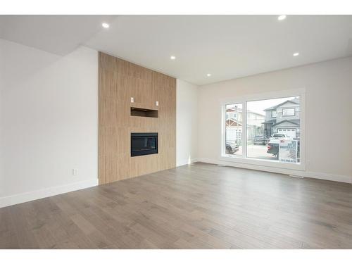 200 Siltstone Place, Fort Mcmurray, AB - Indoor Photo Showing Living Room With Fireplace