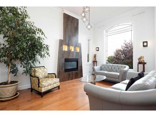 100 Trillium Bay, Fort Mcmurray, AB - Indoor Photo Showing Living Room With Fireplace