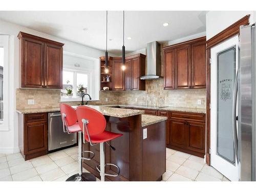 100 Trillium Bay, Fort Mcmurray, AB - Indoor Photo Showing Kitchen With Upgraded Kitchen