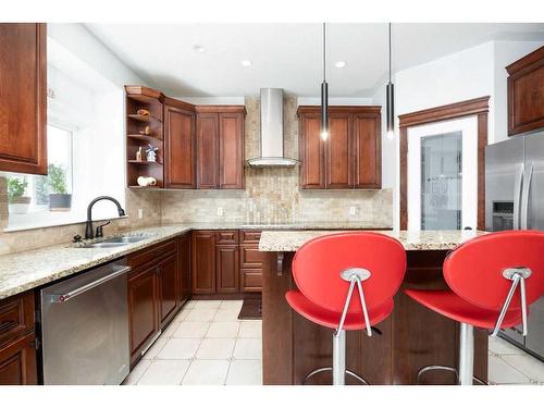 100 Trillium Bay, Fort Mcmurray, AB - Indoor Photo Showing Kitchen With Double Sink