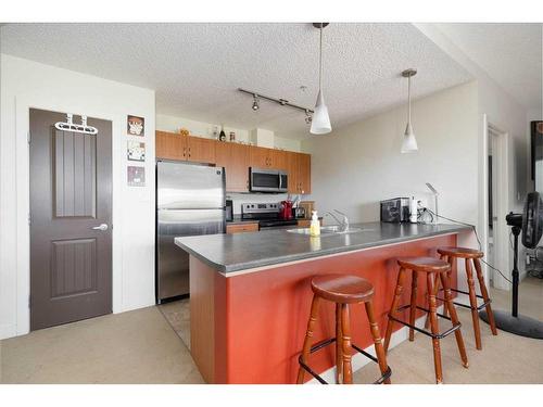 305-136B Sandpiper Road, Fort Mcmurray, AB - Indoor Photo Showing Kitchen With Double Sink