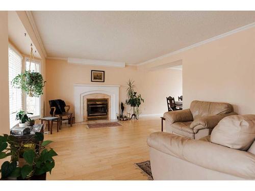 173 Woodland Drive, Fort Mcmurray, AB - Indoor Photo Showing Living Room With Fireplace