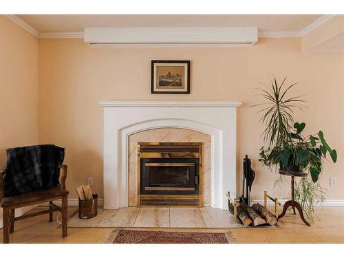 173 Woodland Drive, Fort Mcmurray, AB - Indoor Photo Showing Living Room With Fireplace