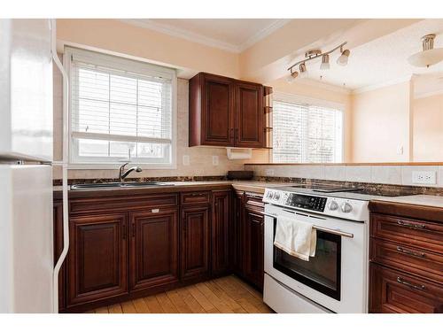 173 Woodland Drive, Fort Mcmurray, AB - Indoor Photo Showing Kitchen With Double Sink