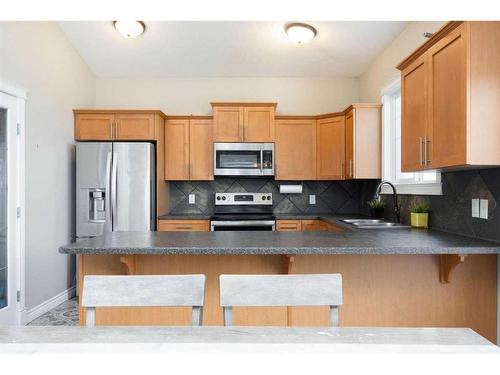 211 Woodpecker Way, Fort Mcmurray, AB - Indoor Photo Showing Kitchen With Stainless Steel Kitchen