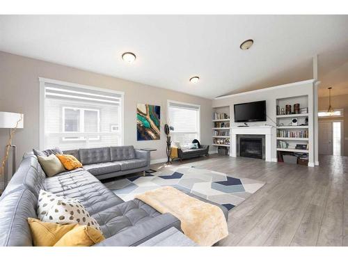 211 Woodpecker Way, Fort Mcmurray, AB - Indoor Photo Showing Living Room With Fireplace