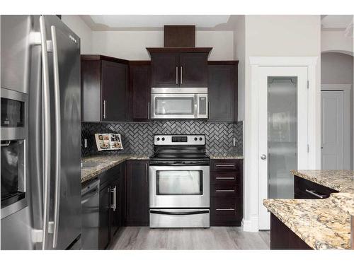 231 Merganser Crescent, Fort Mcmurray, AB - Indoor Photo Showing Kitchen With Stainless Steel Kitchen With Upgraded Kitchen