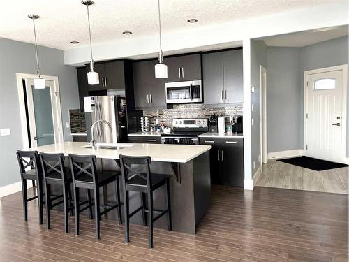 105 Dehoog Crescent, Fort Mcmurray, AB - Indoor Photo Showing Kitchen With Upgraded Kitchen