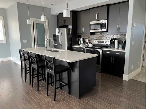 105 Dehoog Crescent, Fort Mcmurray, AB - Indoor Photo Showing Kitchen With Double Sink With Upgraded Kitchen