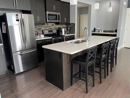 105 Dehoog Crescent, Fort Mcmurray, AB - Indoor Photo Showing Kitchen With Double Sink With Upgraded Kitchen