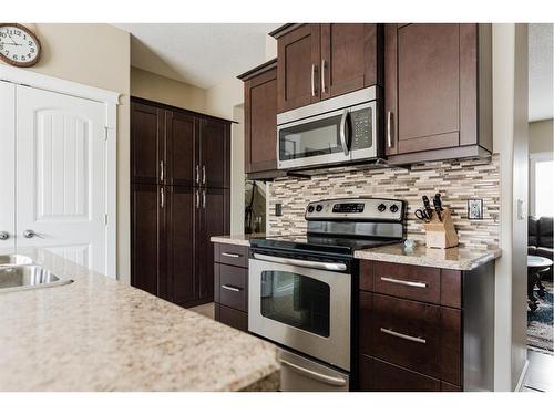 19-300 Sparrow Hawk Drive, Fort Mcmurray, AB - Indoor Photo Showing Kitchen With Stainless Steel Kitchen With Upgraded Kitchen