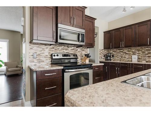 19-300 Sparrow Hawk Drive, Fort Mcmurray, AB - Indoor Photo Showing Kitchen With Double Sink With Upgraded Kitchen