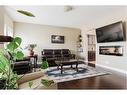 19-300 Sparrow Hawk Drive, Fort Mcmurray, AB  - Indoor Photo Showing Living Room With Fireplace 