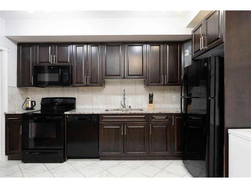 173 Blackburn Drive, Fort Mcmurray, AB - Indoor Photo Showing Kitchen