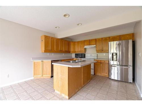 39-97 Wilson Drive, Fort Mcmurray, AB - Indoor Photo Showing Kitchen With Double Sink