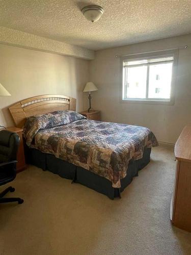 1308-38 Riedel Street, Fort Mcmurray, AB - Indoor Photo Showing Bedroom