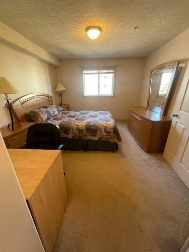 1308-38 Riedel Street, Fort Mcmurray, AB - Indoor Photo Showing Bedroom