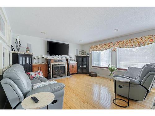 113 Wood Buffalo Way, Fort Mcmurray, AB - Indoor Photo Showing Living Room With Fireplace