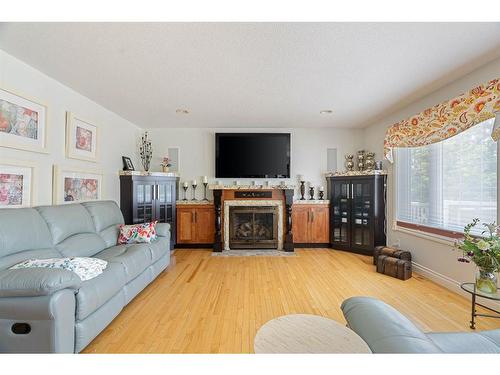 113 Wood Buffalo Way, Fort Mcmurray, AB - Indoor Photo Showing Living Room With Fireplace