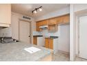 2406-38 Riedel Street, Fort Mcmurray, AB  - Indoor Photo Showing Kitchen With Double Sink 