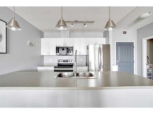 602-136A Sandpiper Road, Fort Mcmurray, AB - Indoor Photo Showing Kitchen With Double Sink With Upgraded Kitchen