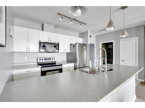 602-136A Sandpiper Road, Fort Mcmurray, AB - Indoor Photo Showing Kitchen With Double Sink With Upgraded Kitchen