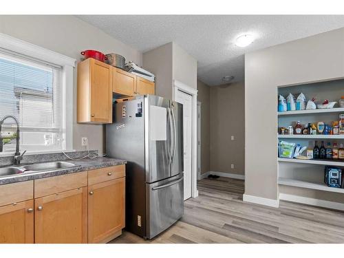 56-313 Millennium Drive, Fort Mcmurray, AB - Indoor Photo Showing Kitchen With Double Sink