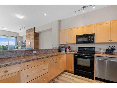 56-313 Millennium Drive, Fort Mcmurray, AB - Indoor Photo Showing Kitchen