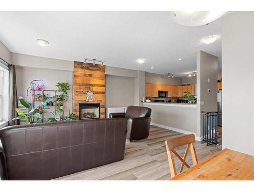 56-313 Millennium Drive, Fort Mcmurray, AB - Indoor Photo Showing Living Room With Fireplace