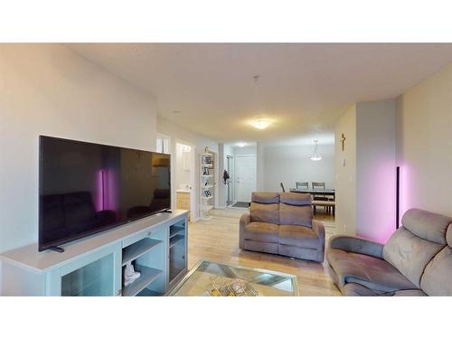 1211-200 Lougheed Drive, Fort Mcmurray, AB - Indoor Photo Showing Living Room