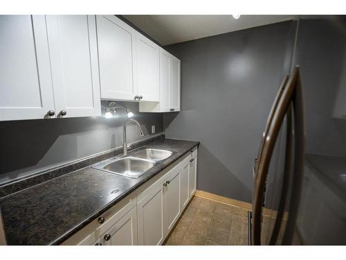 304-11721 Macdonald Drive, Fort Mcmurray, AB - Indoor Photo Showing Kitchen With Double Sink