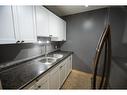 304-11721 Macdonald Drive, Fort Mcmurray, AB  - Indoor Photo Showing Kitchen With Double Sink 