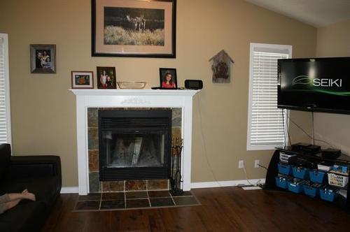 9314 91 Avenue, Lac La Biche, AB - Indoor Photo Showing Living Room With Fireplace