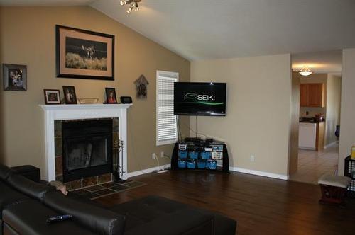 9314 91 Avenue, Lac La Biche, AB - Indoor Photo Showing Living Room With Fireplace