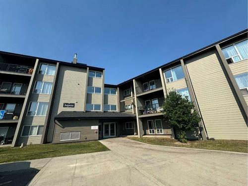 1330-201 Abasand Drive, Fort Mcmurray, AB - Outdoor With Balcony With Facade