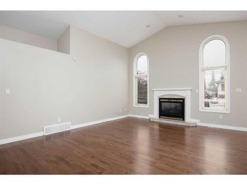 135 Bussieres Drive, Fort Mcmurray, AB - Indoor Photo Showing Living Room With Fireplace