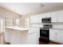 135 Bussieres Drive, Fort Mcmurray, AB  - Indoor Photo Showing Kitchen 