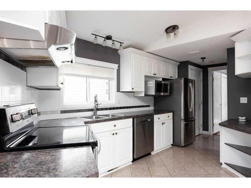 252 Cree Road, Fort Mcmurray, AB - Indoor Photo Showing Kitchen With Double Sink