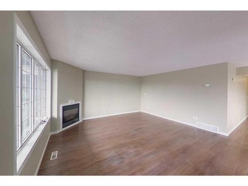 100 Sirius Avenue, Fort Mcmurray, AB - Indoor With Fireplace